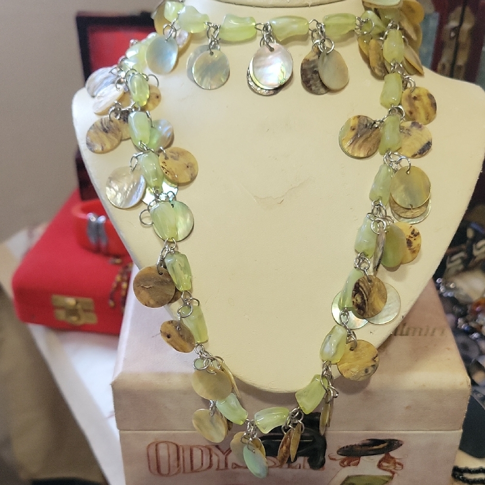 Elegant Shell Necklace with Green Accents